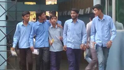 Students coming out of a centre after appearing in their UP Board exams in Prayagraj on Monday. (HT Photo)